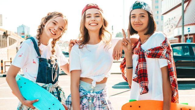 Teens Pair Combat Boots With Skirts and Hoodies