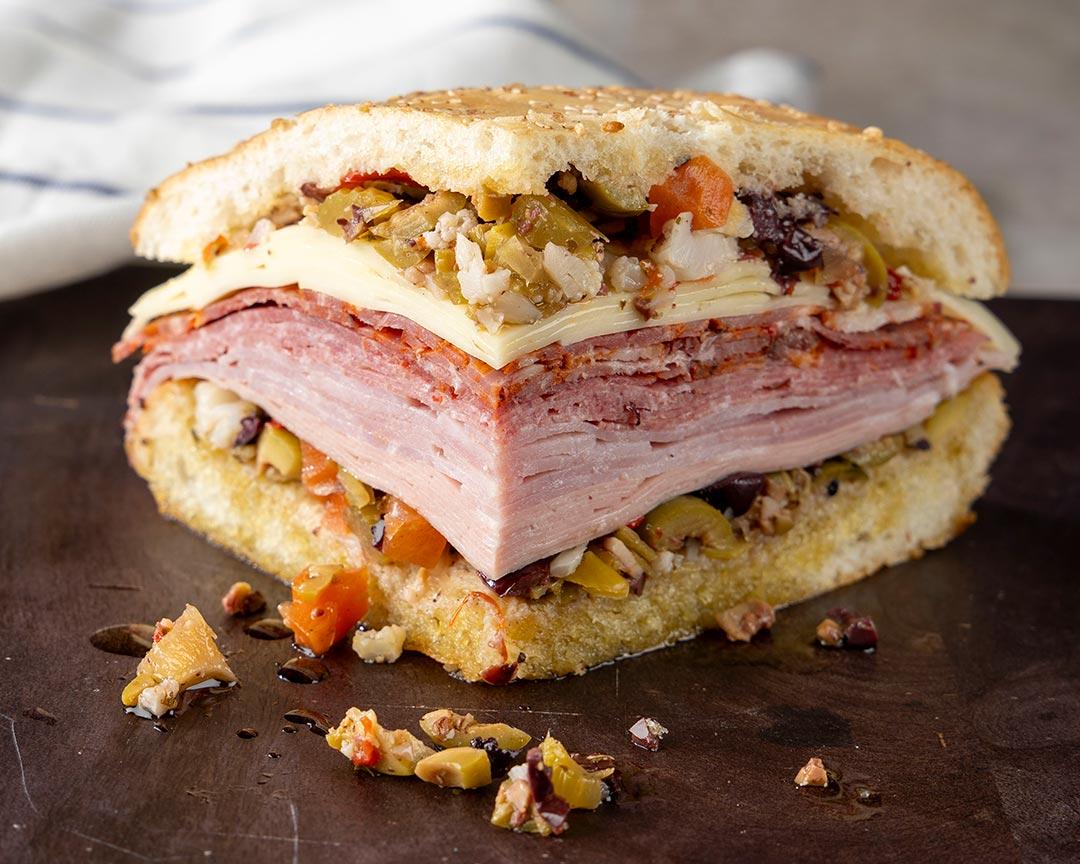A Taste of New Orleans: The Ultimate Muffuletta Sandwich.
