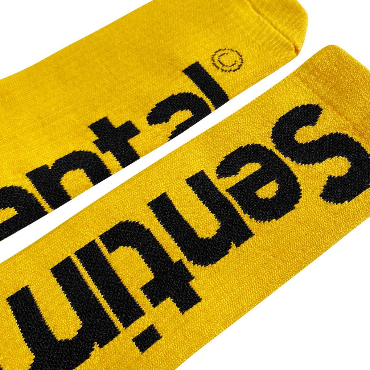 4) Statement Logos: Logos or quirky phrases on socks can serve as playful conversation starters. Brands and designers are integrating clever text and imagery into sock designs, allowing you to wear your interests and beliefs, turning a simple accessory into a canvas for self-expression