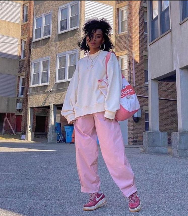 2) Layer Strategically: Layering doesn't mean swamping your frame. Opt for a fitted top beneath an oversized jacket or a cropped cardigan over baggy trousers. Play with proportions to create visual interest while maintaining balance