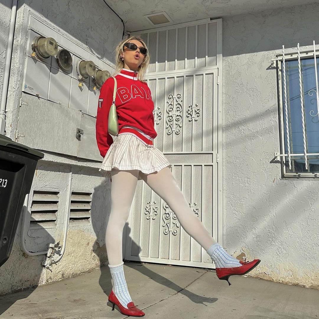 2) Key elements include oversized fits, bold graphics, and nostalgic accessories, reminiscent of 90s street culture and DIY creativity